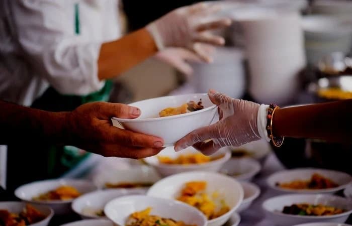 Volunteers serving the community with Rakvih Foundation